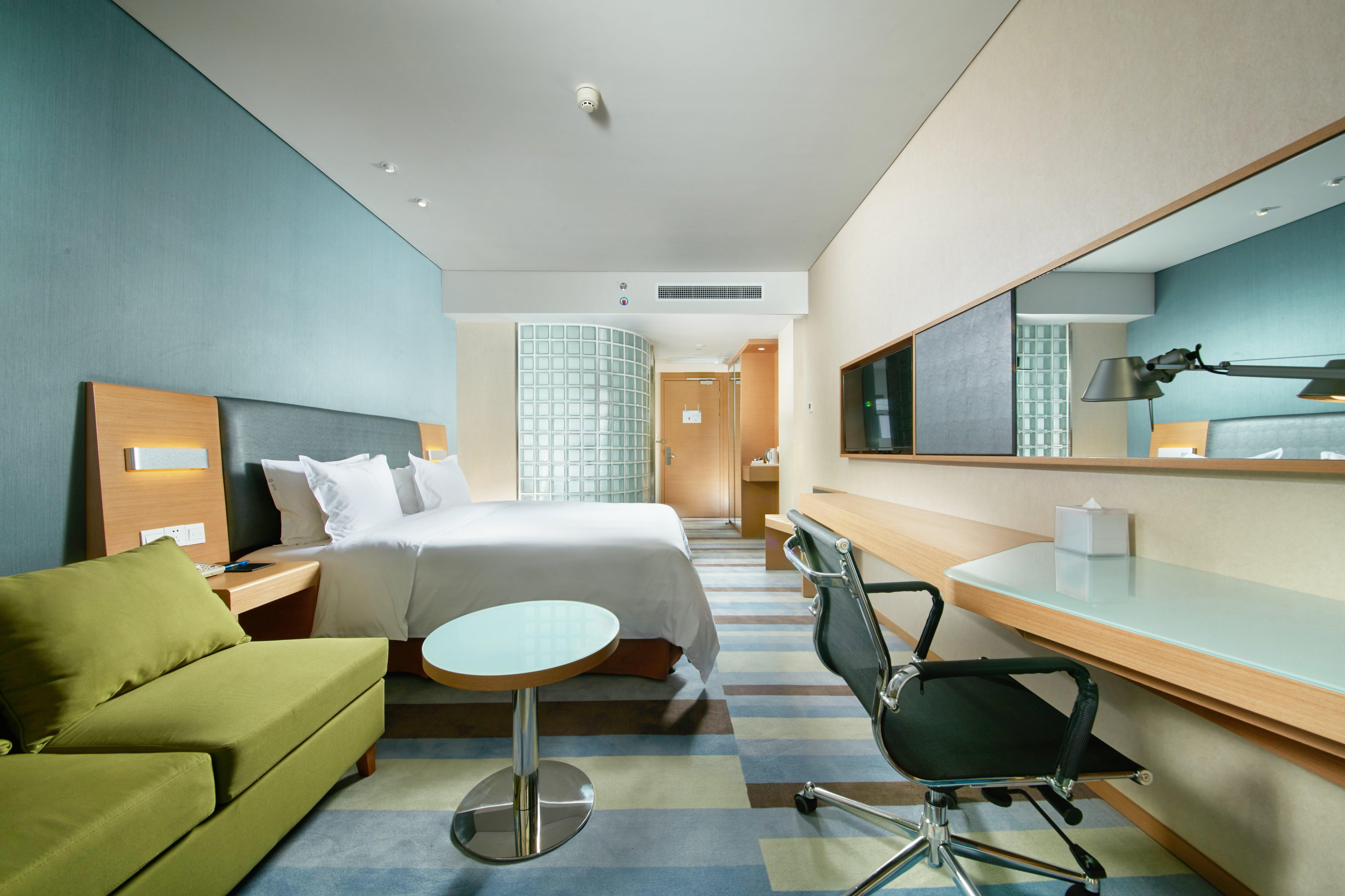 Holiday Inn Express Leshan City Square By Ihg High Speed Rail And Leshan Giant Buddha Exterior photo
