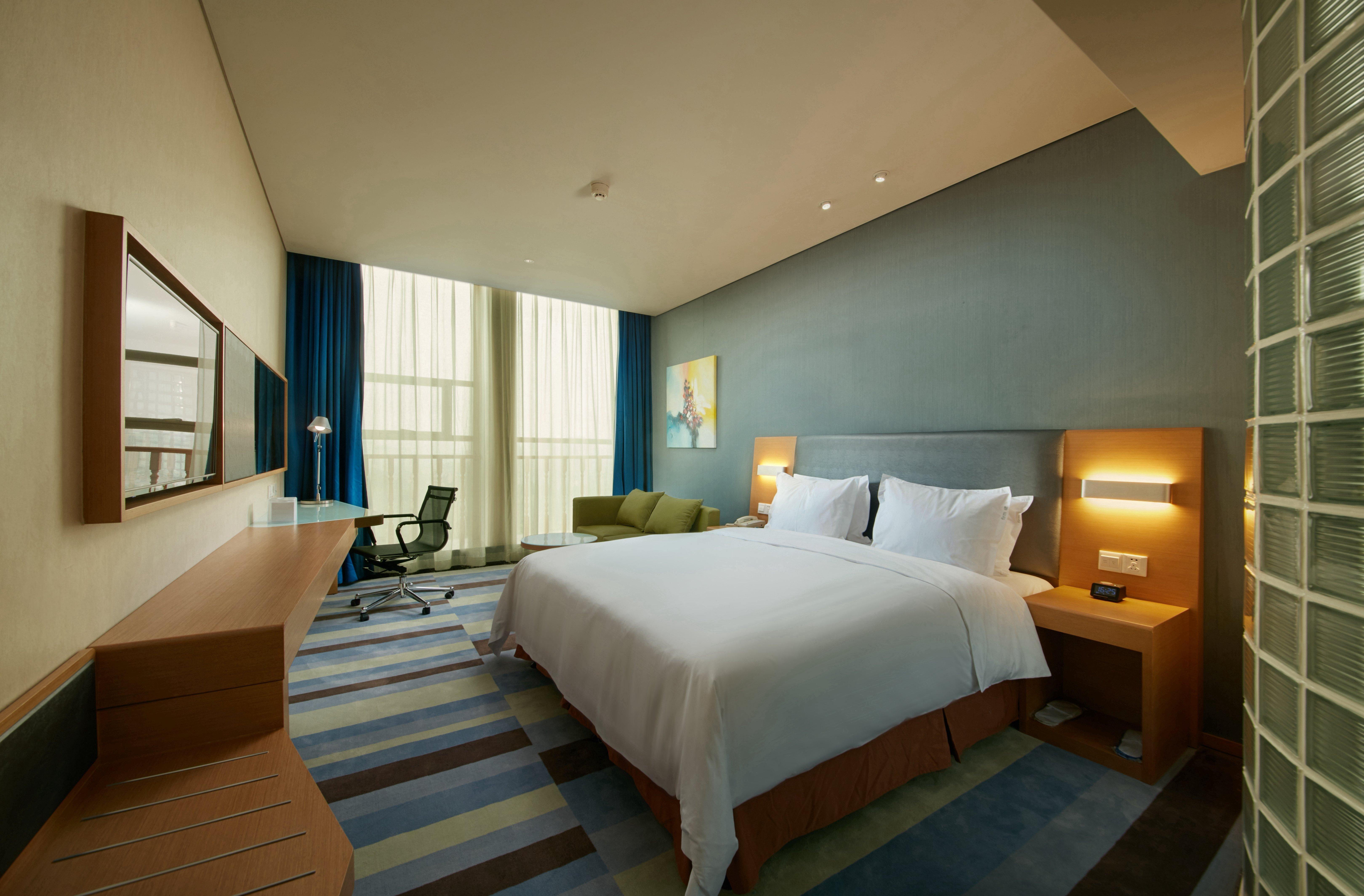 Holiday Inn Express Leshan City Square By Ihg High Speed Rail And Leshan Giant Buddha Exterior photo
